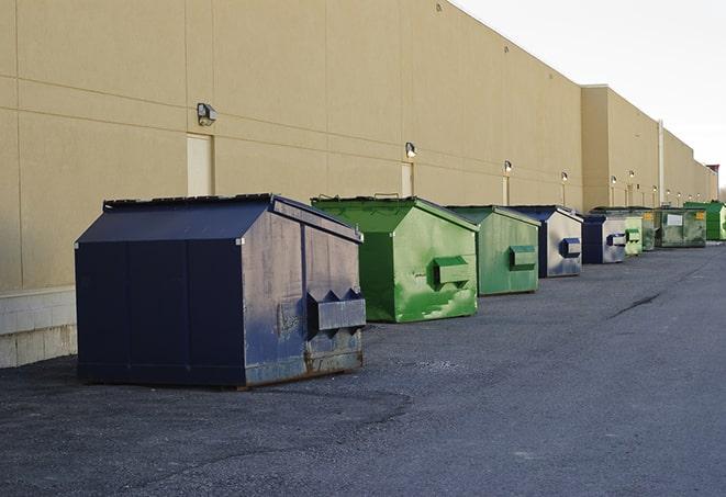 large construction waste containers in a row at a job site in Bowman SC